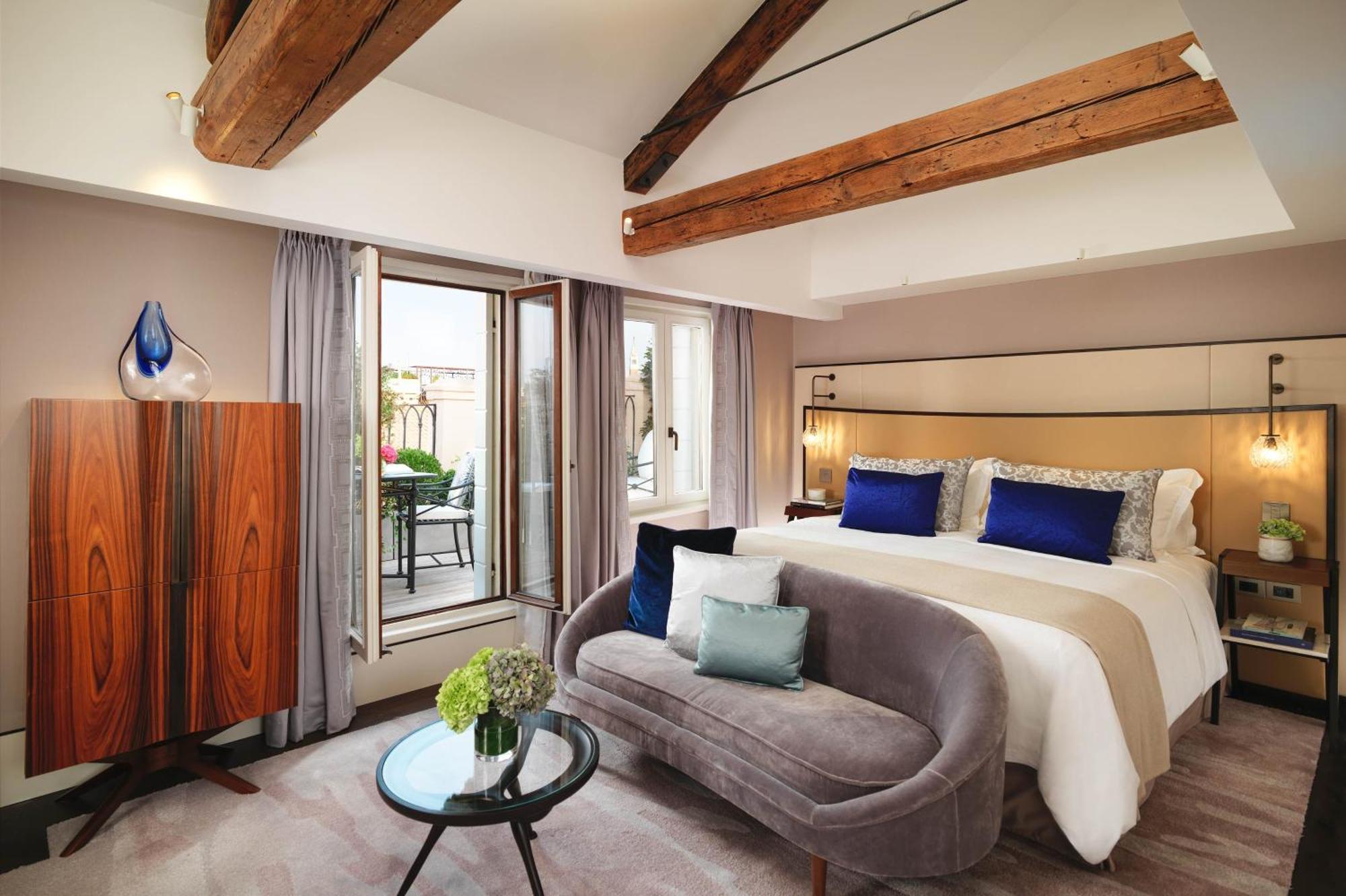 Chambre Lit King-Size avec Terrasse - Vue sur Canal
